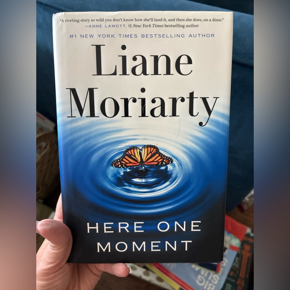 'Here One Moment' Book hardcover by Laine Moriarty